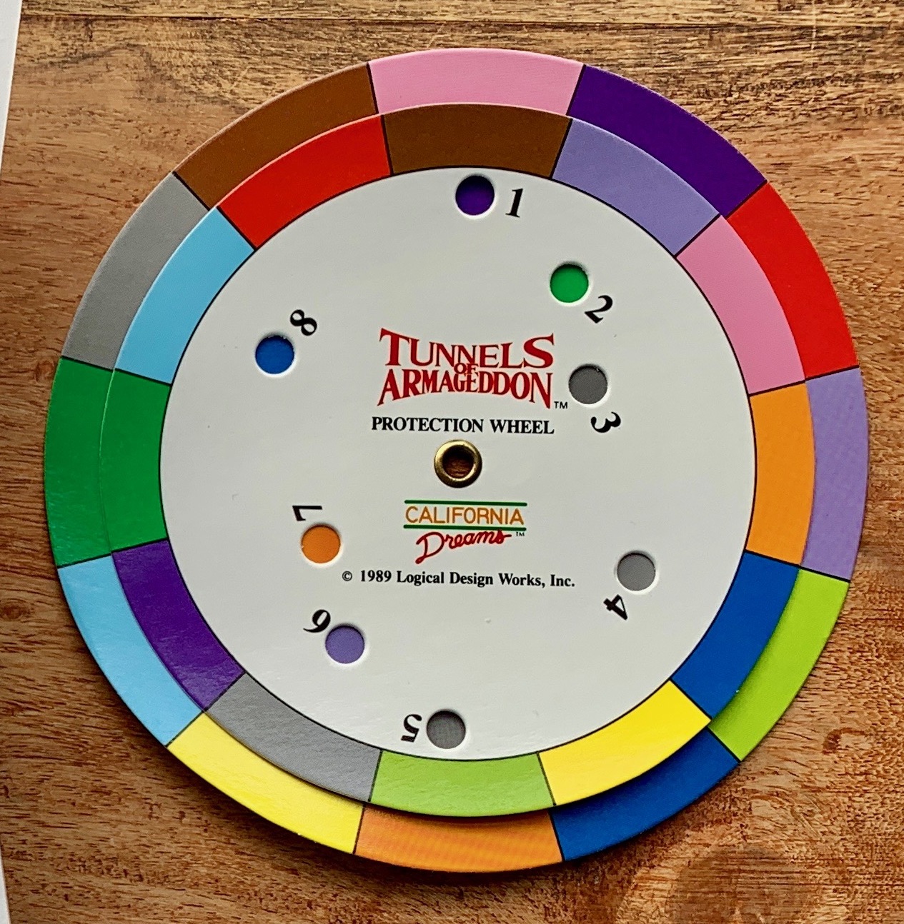 A physical code wheel from Tunnels of Armageddon (1989) — copy protection device